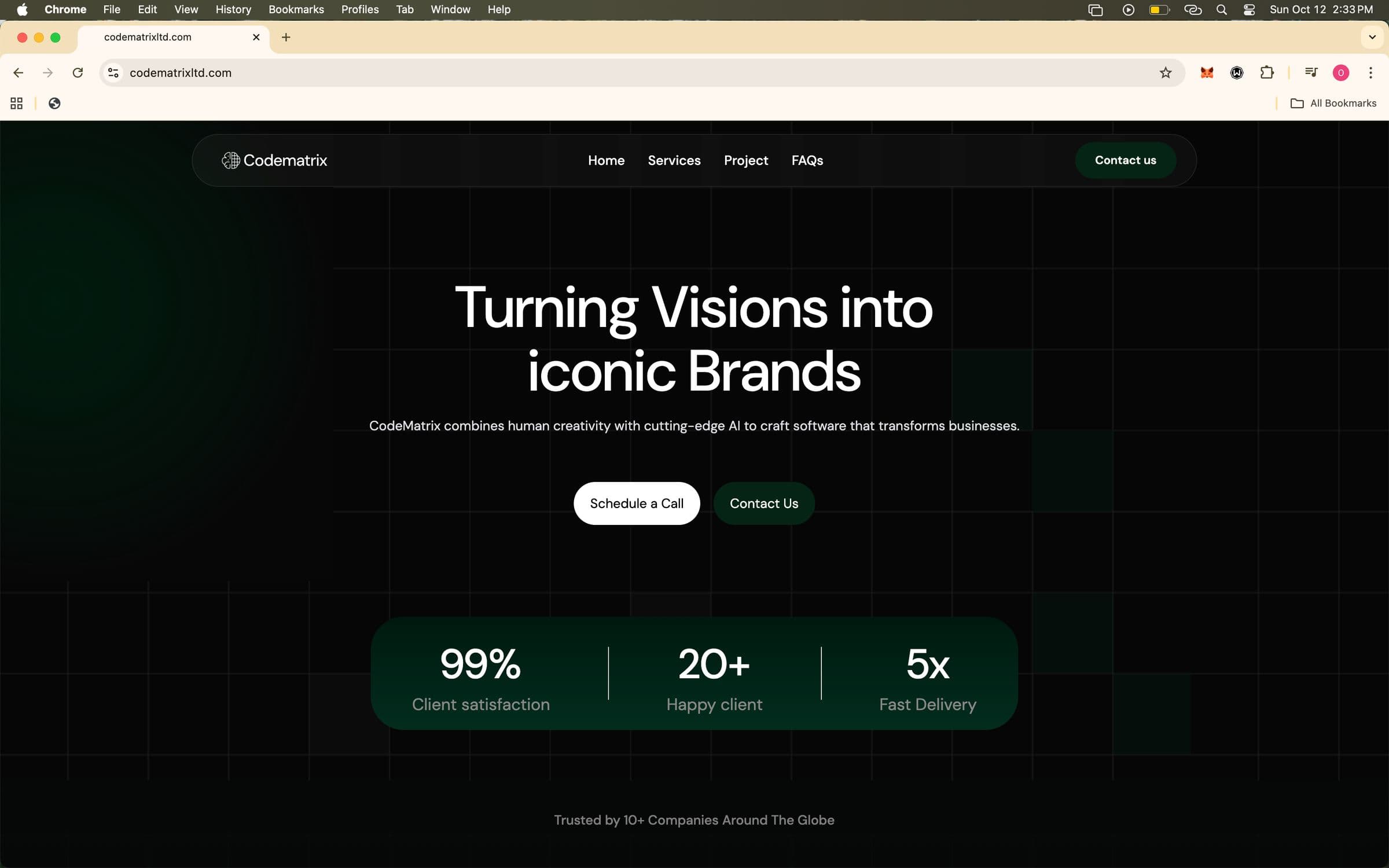 CodeMatrix landing page with the headline Turning Visions into iconic Brands on a dark grid background